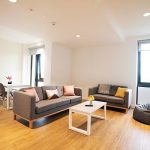 goldcrest village living room with tv